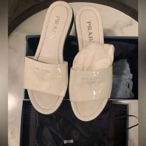 White leather Prada slides